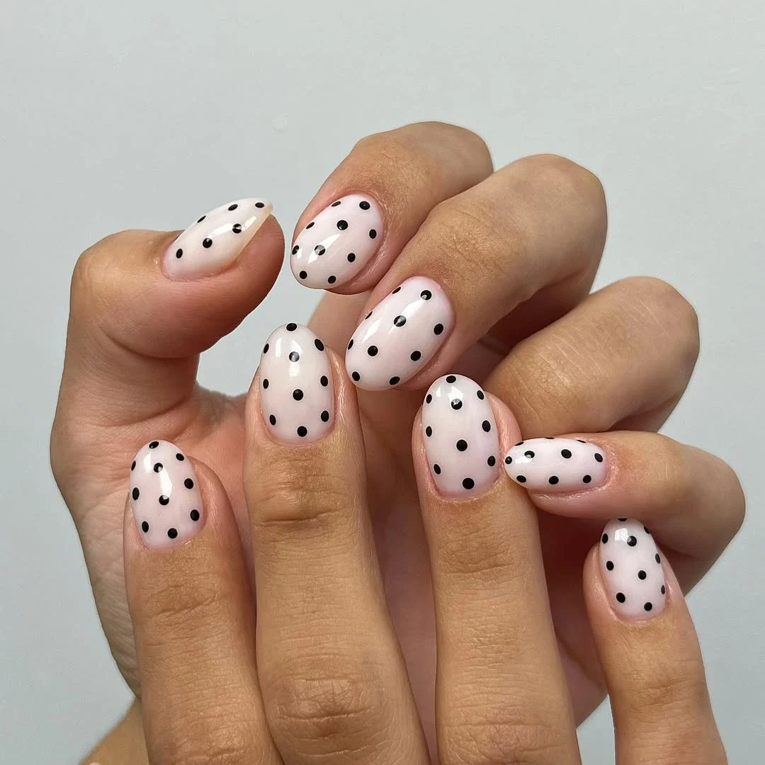 12 Polka Dot Nail Designs for Short Nails That Are Super Cute and Easy 4 Black Polka Dots on Nude Base