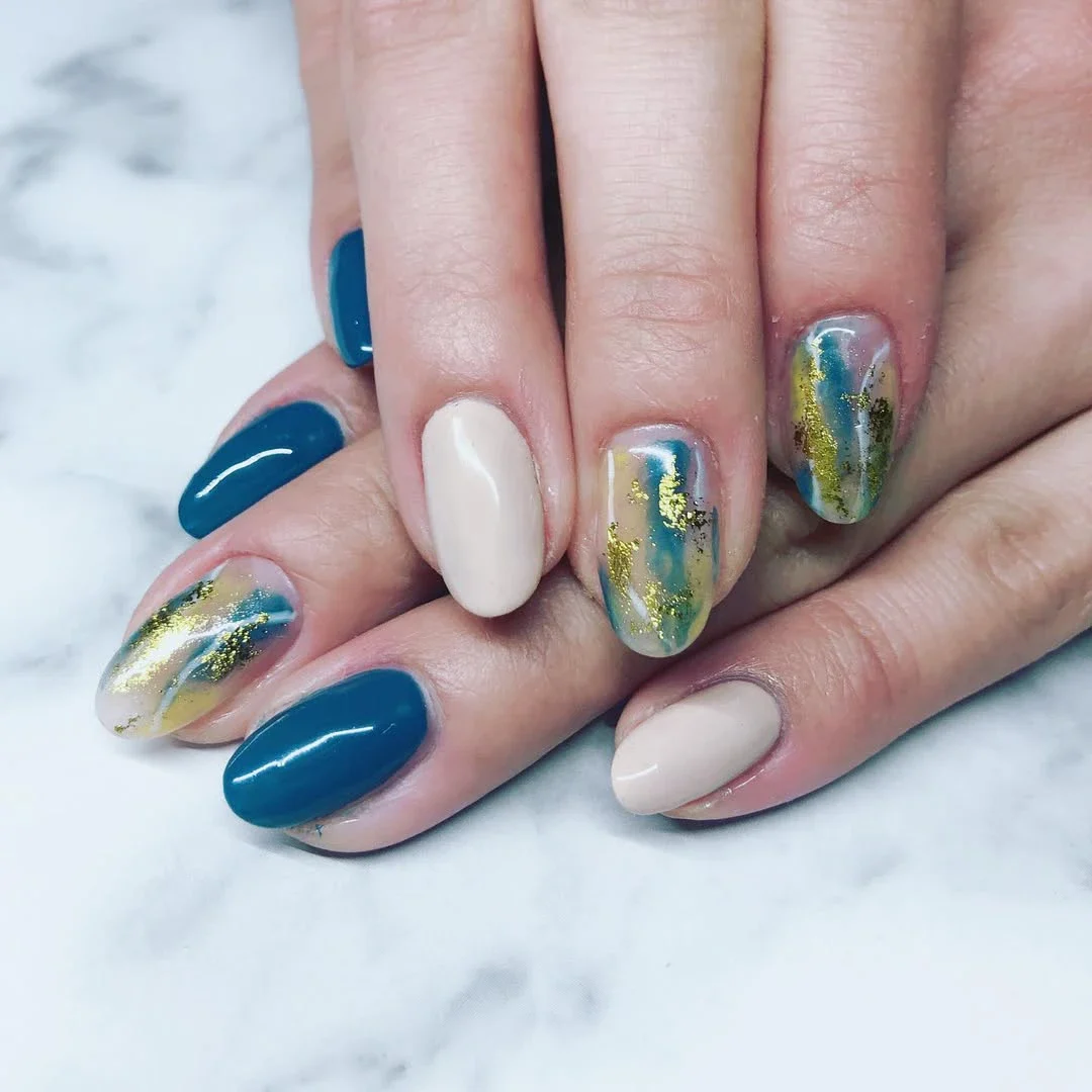 14+ Classy and Chic Blue Nails Ideas to Copy This Year 3 Navy Blue with Gold Foil Accents