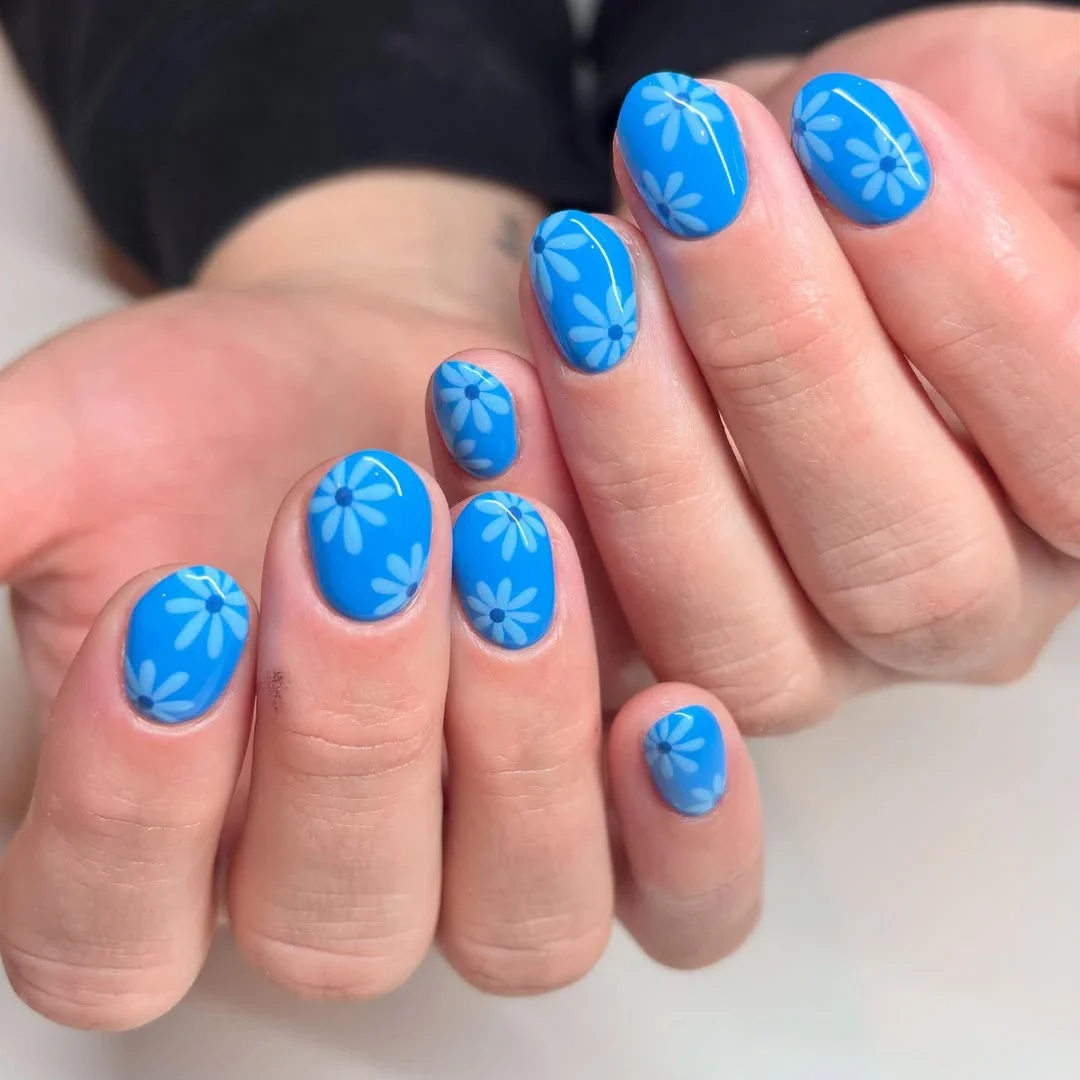 14+ Classy and Chic Blue Nails Ideas to Copy This Year 11 Soft Blue Floral Nail Art